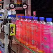 warehouse photography blog fs40 scanning conveyor bottles 1280x720 1