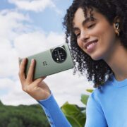 OnePlus 11 lifestyle Eternal Green phone and Arbor Green OnePlus Buds Pro 2