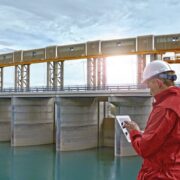 Ratio 16 9 Man working at a water barrier