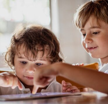 Kids using a digital tablet 1178068262 5472x3648 1